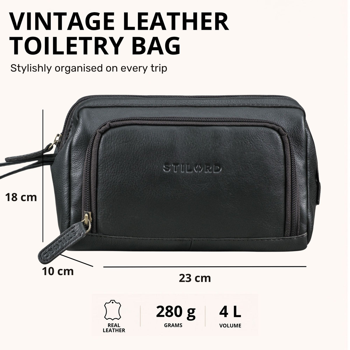 Black leather toiletry bag with STILORD embossing, front view showing zip pocket and measurement markings