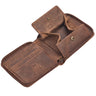 Open genuine leather wallet in medium brown with Wiener coin pocket, card slots, zipper edge and RFID stamp, angled close-up.
