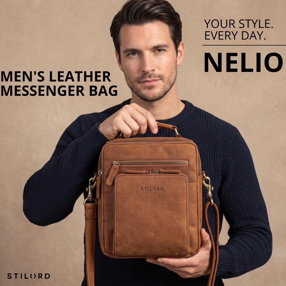 Man holding small tan brown leather messenger bag front view, top handle and shoulder strap visible, STILORD embossing