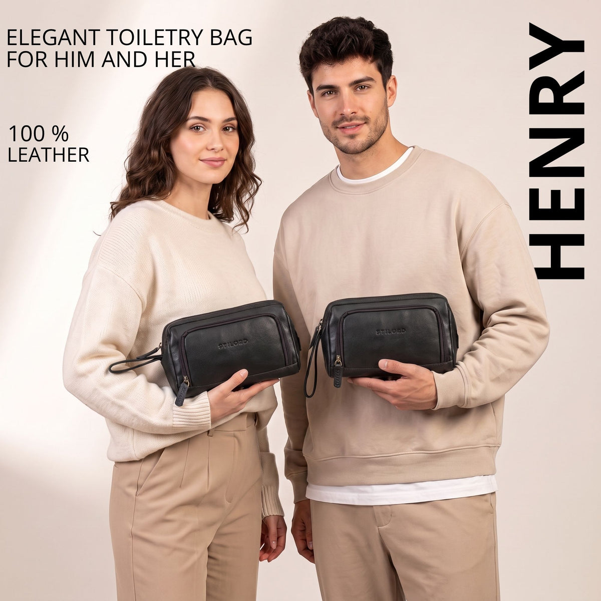 Black leather toiletry bag, front view with STILORD embossing, held by man and woman