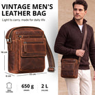 Flat men's leather crossbody bag Salerno brown, front detail and worn by model, fits 8-inch tablet
