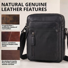 Kleine schwarze Leder-Umhängetasche, Frontansicht mit Außentaschen, Reißverschluss und verstellbarem Riemen